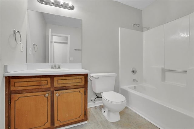 full bathroom with vanity, bathing tub / shower combination, tile patterned floors, and toilet