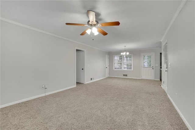 spare room featuring light carpet, crown molding, and ceiling fan with notable chandelier