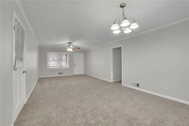 unfurnished room featuring ornamental molding, ceiling fan with notable chandelier, and light carpet