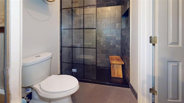 bathroom featuring tile patterned floors and toilet