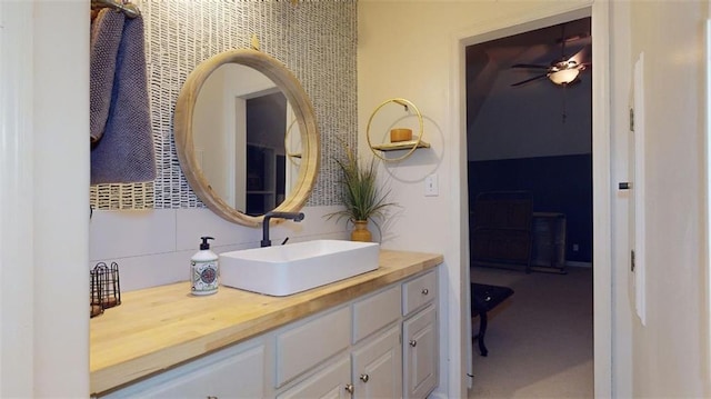 bathroom featuring vanity and ceiling fan