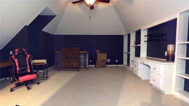 interior space with ceiling fan and lofted ceiling