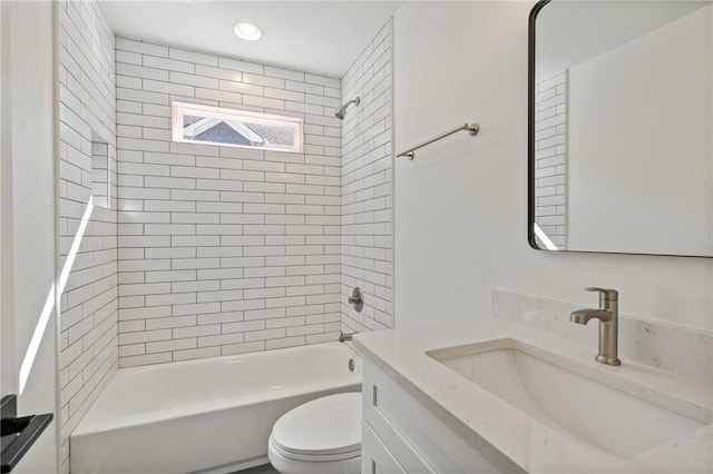 bathroom with toilet, recessed lighting, vanity, and shower / bathtub combination