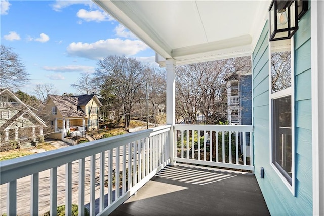 balcony featuring covered porch