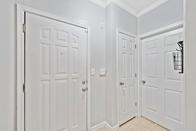 tiled entryway with crown molding