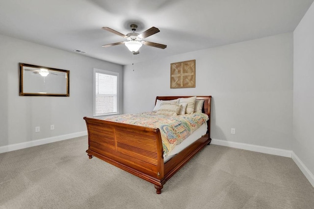 bedroom featuring visible vents, carpet floors, baseboards, and ceiling fan