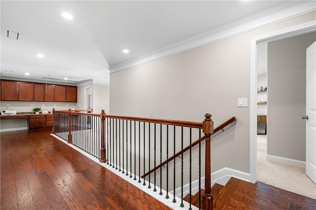 5115 Edgebrook Dr, Cumming, GA 30040 - hall featuring crown molding, recessed lighting, an upstairs landing, and dark wood-style flooring