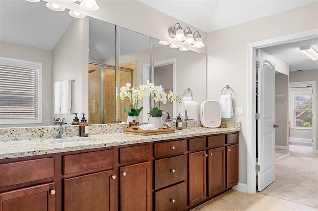 5115 Edgebrook Dr, Cumming, GA 30040 - full bath with a shower stall, double vanity, and tile patterned floors