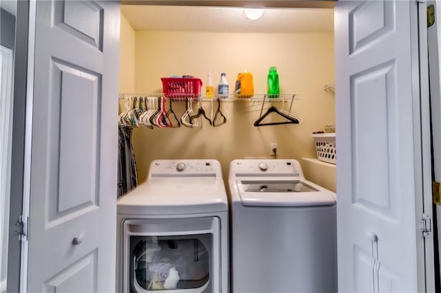 laundry room with laundry area and separate washer and dryer