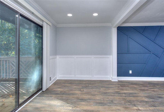 empty room with ornamental molding, dark hardwood / wood-style floors, and a healthy amount of sunlight