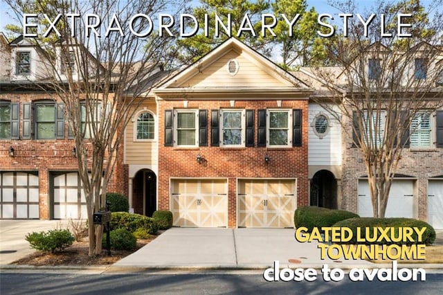 view of property with driveway, an attached garage, and brick siding