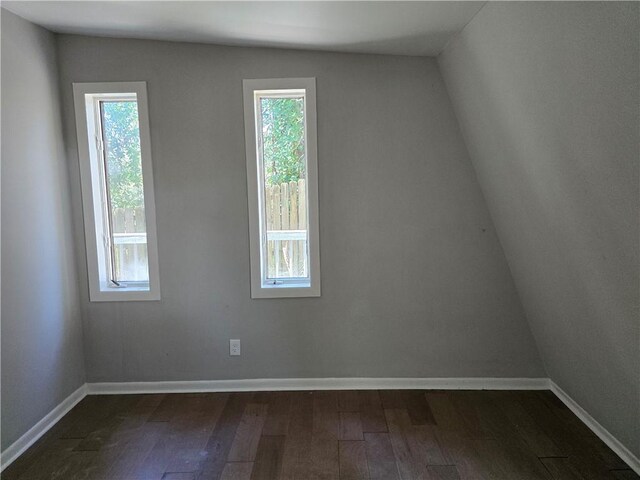 1920 Moores Mill Rd NW, Atlanta, GA 30318 - empty room with dark wood-type flooring and baseboards