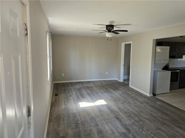 1920 Moores Mill Rd NW, Atlanta, GA 30318 - interior space featuring baseboards, wood finished floors, and ceiling fan