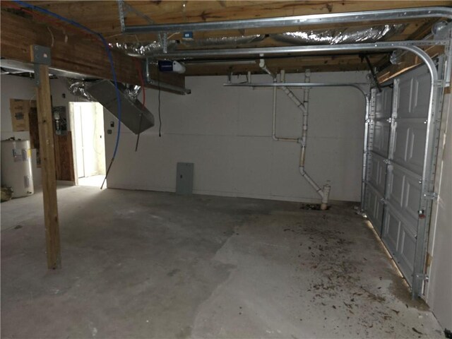 1920 Moores Mill Rd NW, Atlanta, GA 30318 - garage featuring electric water heater and a garage door opener