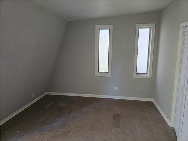 1920 Moores Mill Rd NW, Atlanta, GA 30318 - unfurnished room with baseboards and dark wood-style flooring