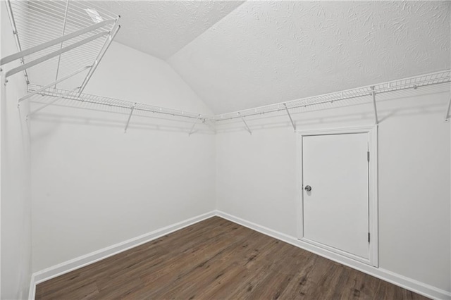 3405 Summer Brooke Way, Union City, GA 30291 - walk in closet featuring vaulted ceiling and wood finished floors