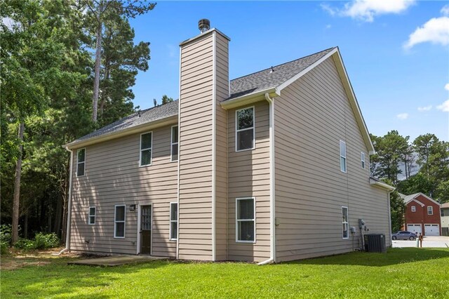3405 Summer Brooke Way, Union City, GA 30291 - rear view of property with a chimney and a yard