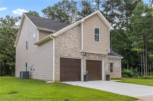 3405 Summer Brooke Way, Union City, GA 30291 - view of home's exterior featuring concrete driveway, a garage, a lawn, and brick siding