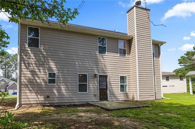 3405 Summer Brooke Way, Union City, GA 30291 - back of property featuring a chimney, a lawn, and a patio