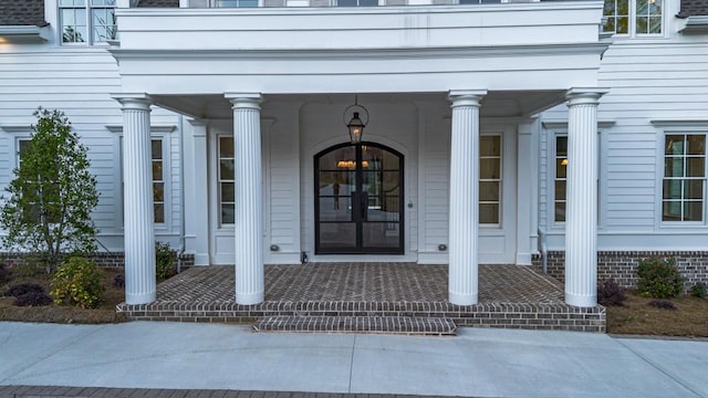 property entrance featuring covered porch