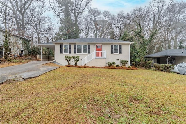 2504 Brentwood Rd, Decatur, GA 30032 - single story home with concrete driveway, a carport, and a front lawn