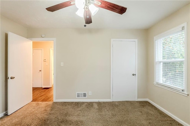 2504 Brentwood Rd, Decatur, GA 30032 - carpeted spare room featuring baseboards, ceiling fan, and visible vents
