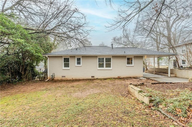 2504 Brentwood Rd, Decatur, GA 30032 - back of property featuring crawl space, a patio, brick siding, and a yard