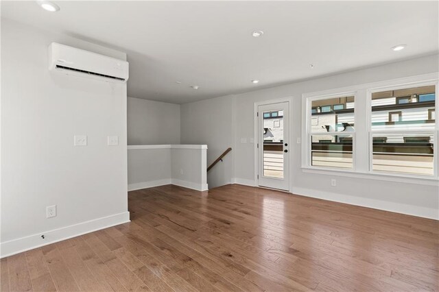 living room with ceiling fan, wood walls, crown molding, and dark hardwood / wood-style flooring