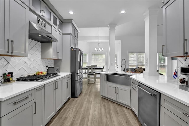 2330 Wood Creek Ct, Dacula, GA 30019 - kitchen featuring appliances with stainless steel finishes, exhaust hood, gray cabinetry, and recessed lighting