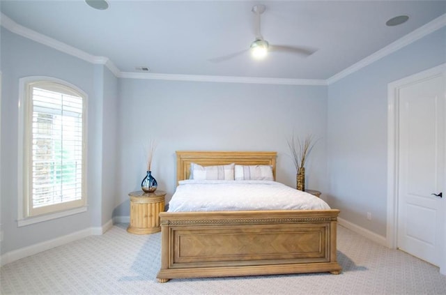 bedroom with light carpet, baseboards, visible vents, a ceiling fan, and ornamental molding