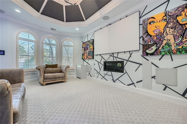 carpeted living room with a tray ceiling, crown molding, recessed lighting, visible vents, and baseboards