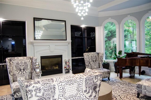 kitchen featuring premium appliances, backsplash, pendant lighting, a breakfast bar, and white cabinets