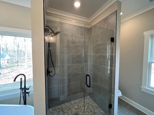 bathroom with walk in shower, ornamental molding, toilet, and tile patterned flooring