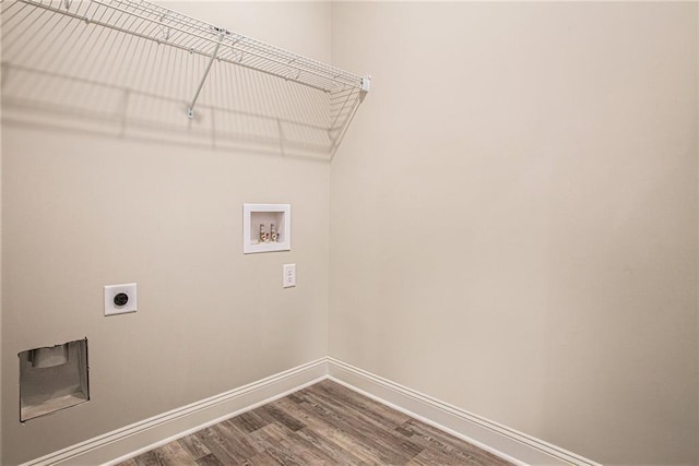 laundry room featuring hookup for a washing machine, wood-type flooring, and hookup for an electric dryer