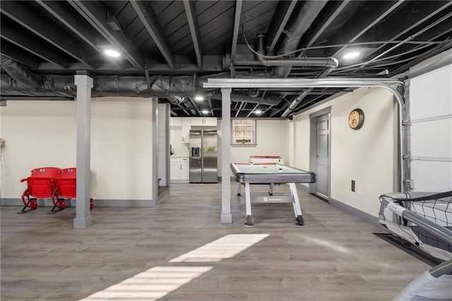 game room featuring hardwood / wood-style floors