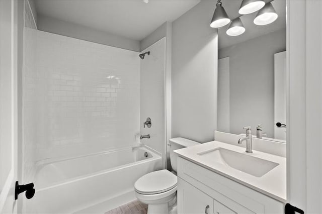 full bathroom featuring shower / washtub combination, vanity, and toilet