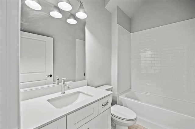 full bathroom with  shower combination, vanity, and toilet