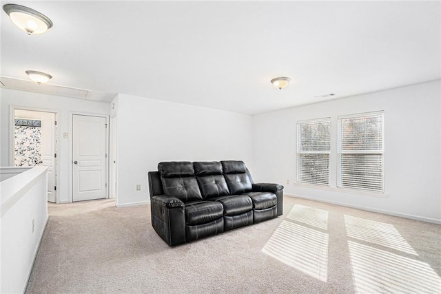 living room featuring light colored carpet