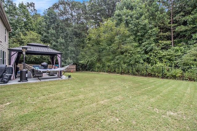 view of yard featuring a gazebo and a patio