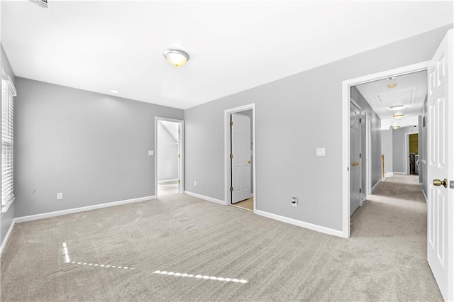 unfurnished bedroom with light carpet