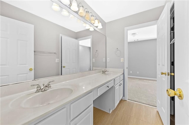 bathroom featuring vanity and wood-type flooring