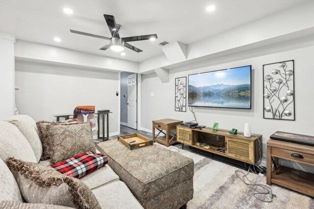 living room featuring ceiling fan