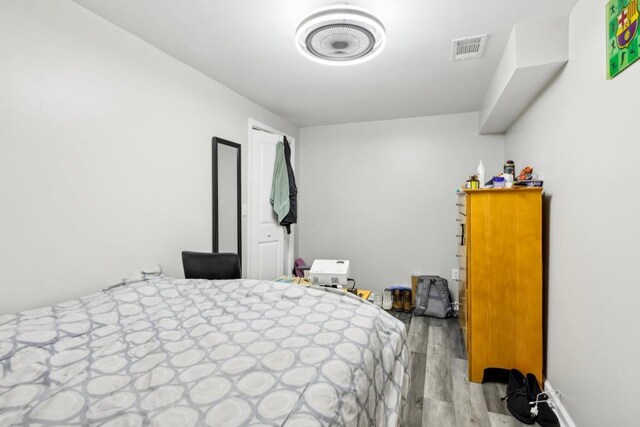 bedroom featuring light wood-type flooring