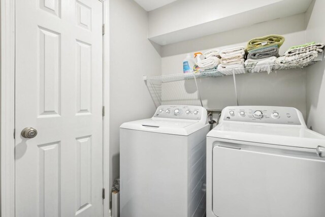 laundry area featuring washer and clothes dryer