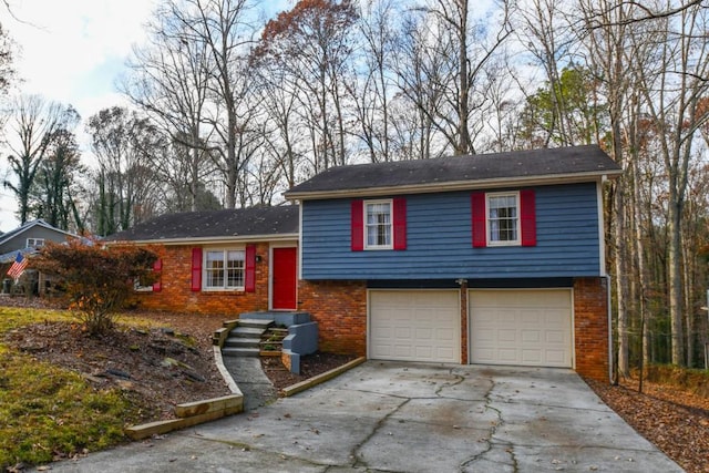 split level home featuring a garage