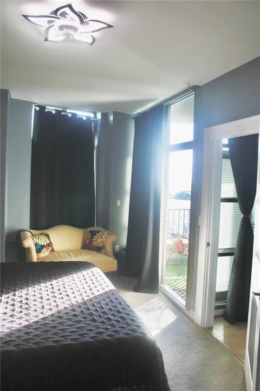 250 Park Ave W Unit 802, Atlanta, GA 30313 - bedroom featuring access to outside and light colored carpet