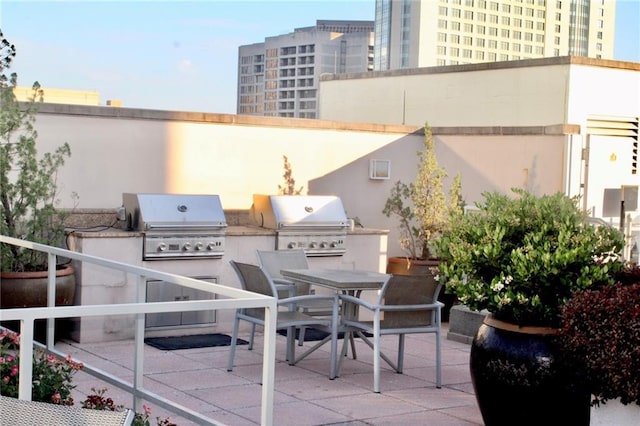 250 Park Ave W Unit 802, Atlanta, GA 30313 - view of patio with exterior kitchen, a grill, and outdoor dining space
