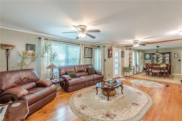 7234 Post Rd, Winston, GA 30187 - living area with ceiling fan, light wood finished floors, and ornamental molding