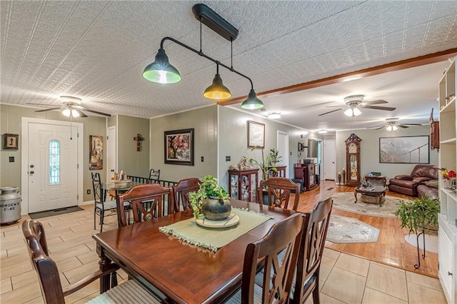 7234 Post Rd, Winston, GA 30187 - dining space featuring a ceiling fan, light wood-style flooring, and ornamental molding