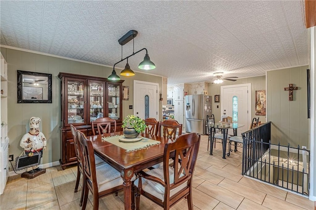 7234 Post Rd, Winston, GA 30187 - dining room featuring ceiling fan and ornamental molding